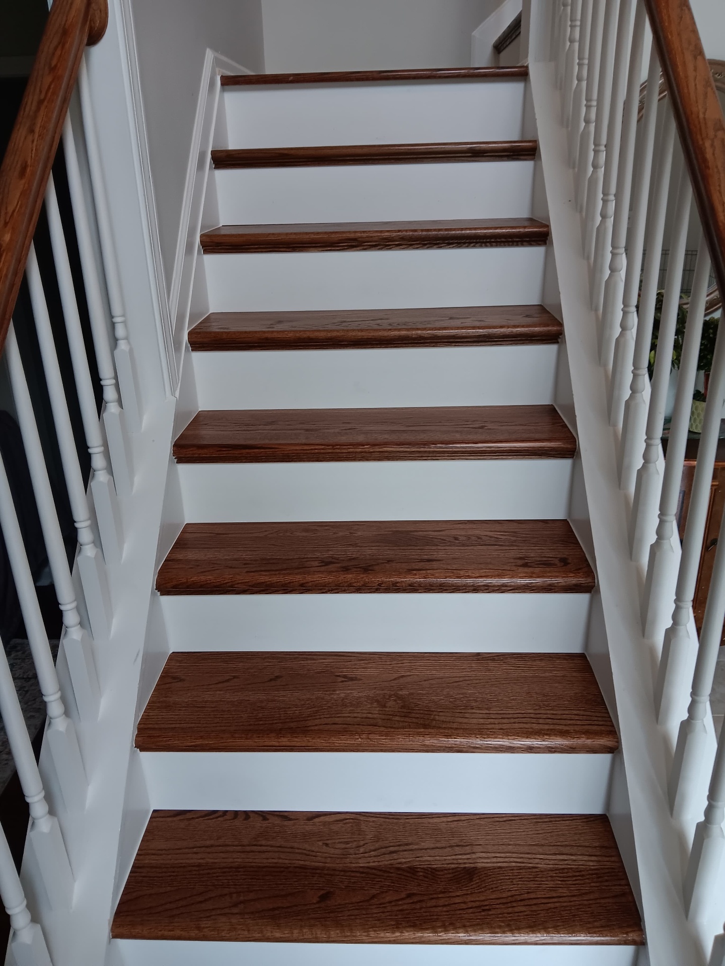 Custom hardwood staircase with white risers